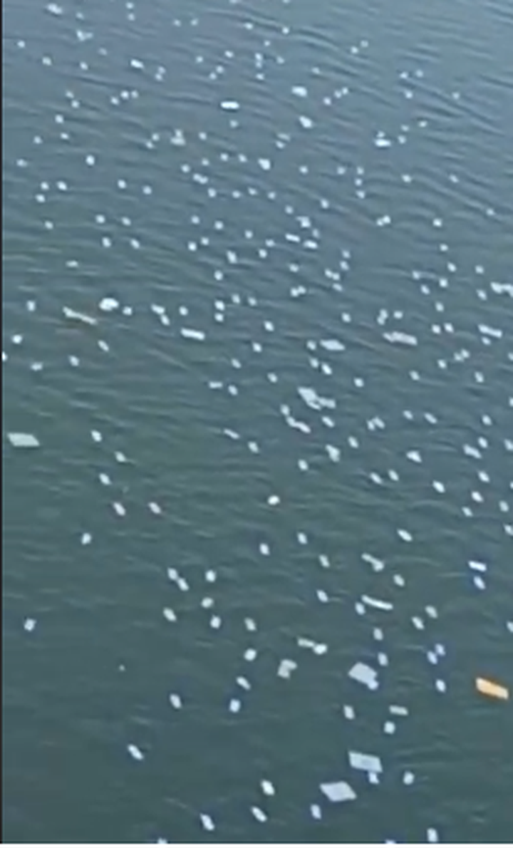 Votive papers dumped in Huong River - 2