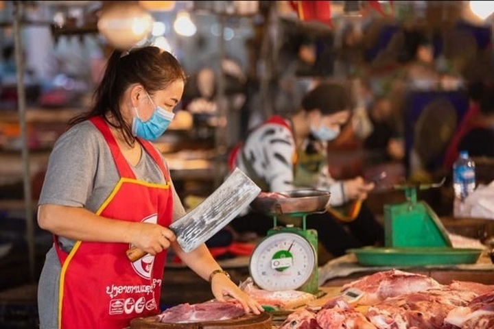Laos strengthens measures to curb inflation - 1