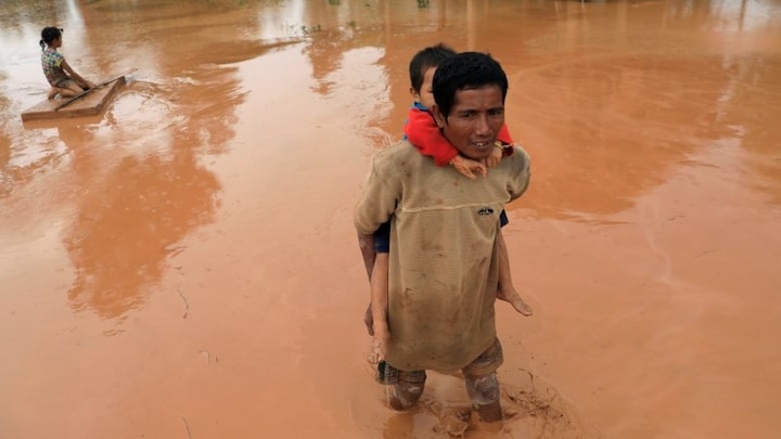 Survivors of deadly Laos dam collapse homeless a year on: report - 1