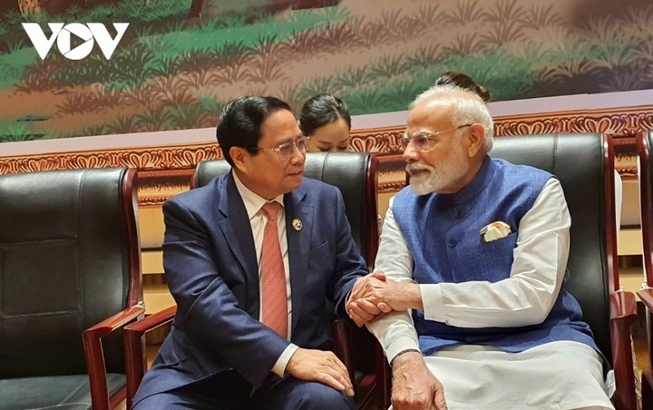 PM Chinh meets with Japanese and Indian counterparts in Laos - 2