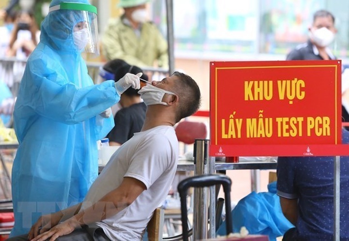 Vietnam reports additional 14,835 COVID-19 cases - 1