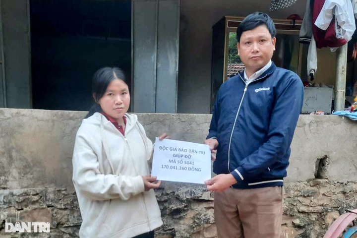 Nghe An woman receives VND200 million to support two ill children - 1