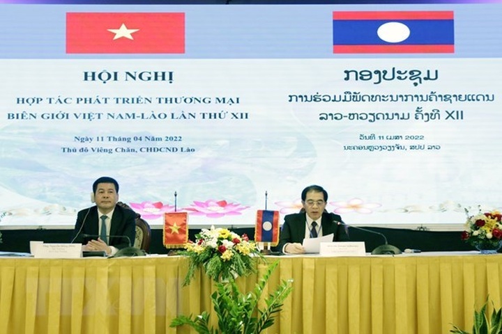 Vietnam, Laos work to foster border trade collaboration - 1