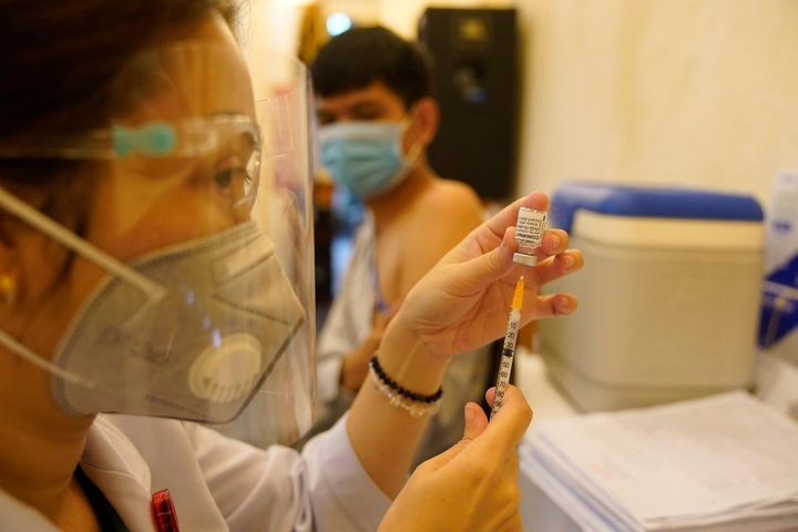HCM City to carry out Covid-19 vaccination after 6 pm - 1
