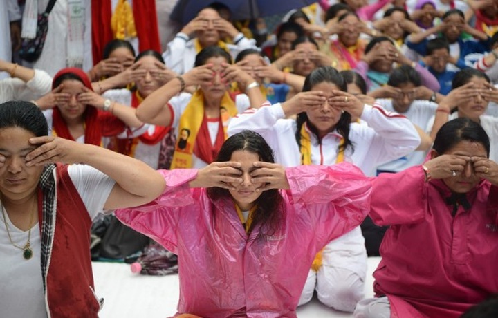 Yoga connecting world, says Modi as millions stretch and bend - 1