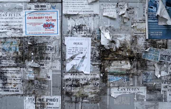 Public advertising boards in Hanoi misused - 1