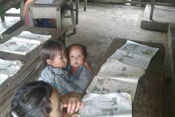 Struggling pupils take care of siblings in class - 1 Struggling pupils take care of siblings in class - 1