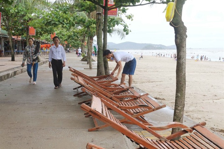 Two dead, hectares of rice flooded due to typhoon Son Tinh - 1