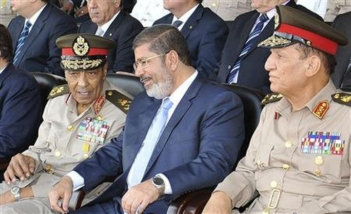 Egypt president sweeps out army rulers - 1