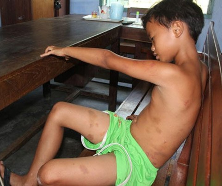 Kid chained and beaten by his father - 1