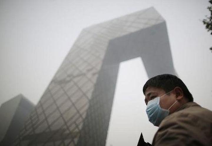 China must cut pollution by half before environment improves: official - 1