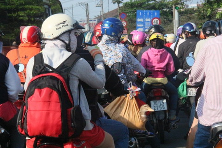 Mass return to HCM City as Tet holiday draws to a close - 4 Mass return to HCM City as Tet holiday draws to a close - 4