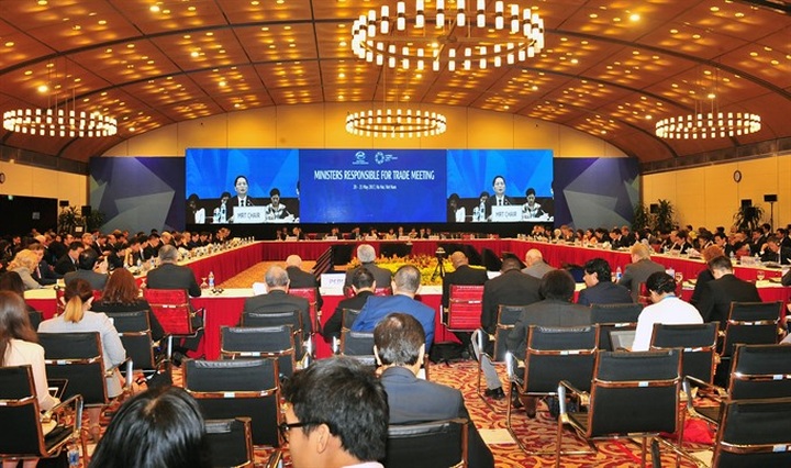 APEC ministers pledge free trade - 1