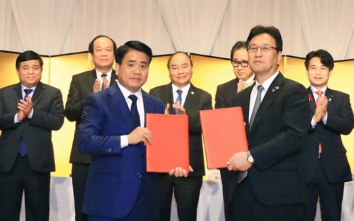 Japanese investors pledge USD1-billion investments into Hanoi - 1