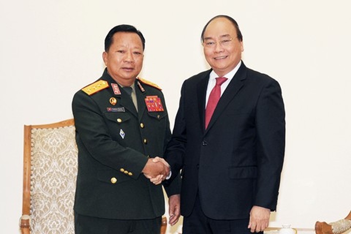 PM receives Lao Minister of National Defense - 1