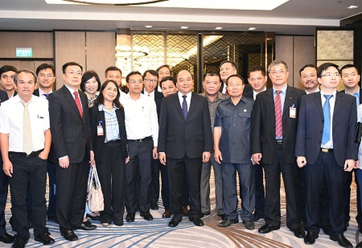 PM meets Vietnamese firms investing in Laos - 1