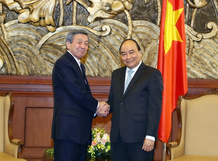 PM calls on Japanese ruling party to boost ties with Vietnam - 1