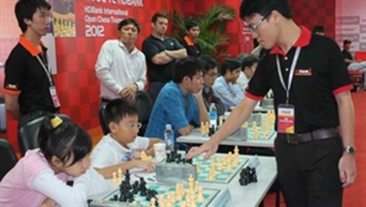Quang Liem regains international super GM title - 1