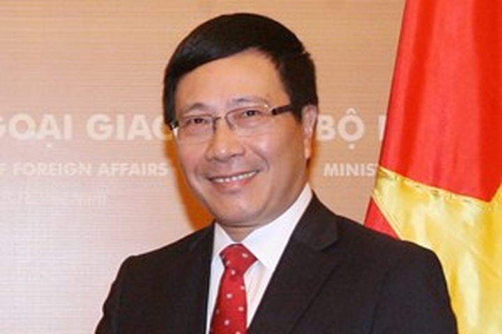 Deputy PM Minh speaks with Chinese State Councillor - 1