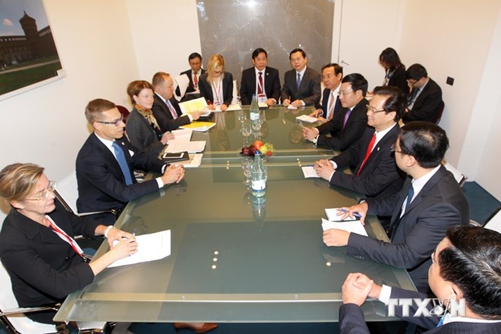 PM Dung’s bilateral meetings on ASEM 10 sidelines - 3