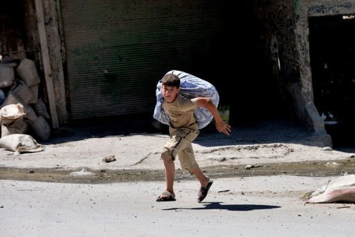 UN chief leads world outcry over Syria 'massacre' - 1