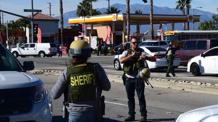 Two suspects dead after 14 killed in shooting rampage in California - 1