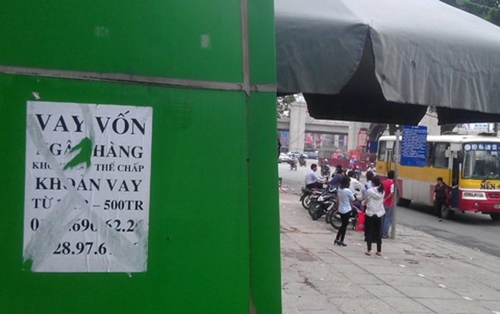 Loan advertisements available on streets - 1