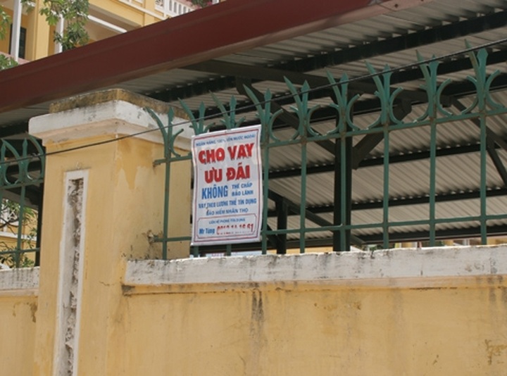 Loan advertisements available on streets - 2