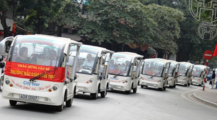 Solar electric car tours in Hanoi - 1