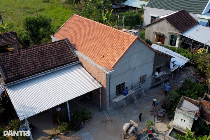 Disabled sons and elderly father near new home after aid - 2
