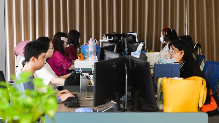 Trung Quốc: Người thất nghiệp thuê chỗ ngồi ở văn phòng giả - 1