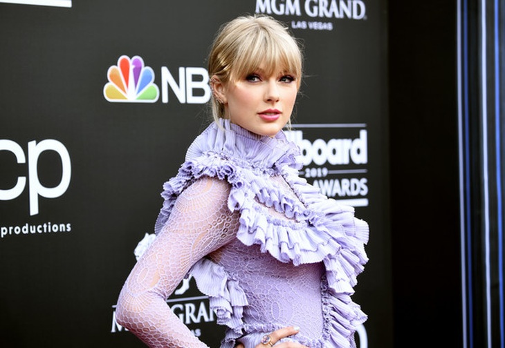 Taylor Swift xinh đẹp khoe chân dài - Ảnh 13.