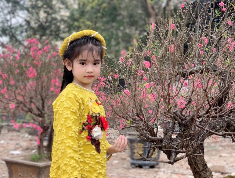 Em bé Hà Nội xinh phát hờn giữa hương xuân sắc Tết - 5 Em bé Hà Nội xinh phát hờn giữa hương xuân sắc Tết - 5