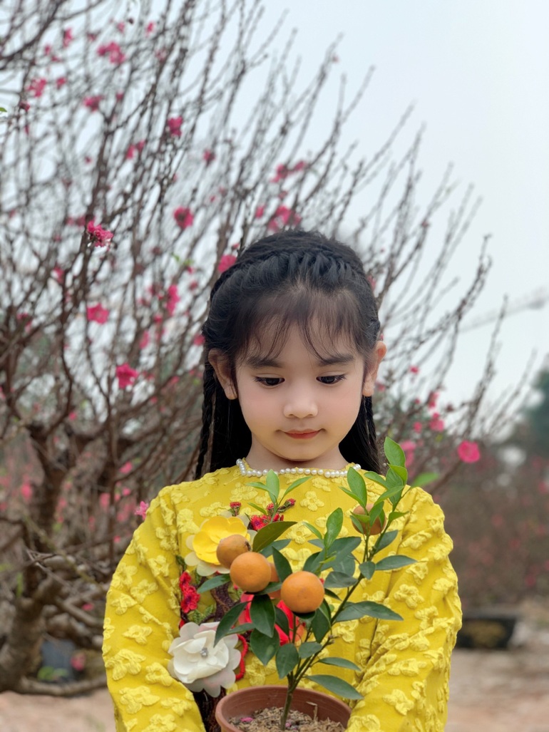 Em bé Hà Nội xinh phát hờn giữa hương xuân sắc Tết - 7 Em bé Hà Nội xinh phát hờn giữa hương xuân sắc Tết - 7