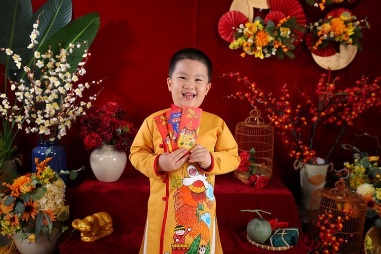 Lì xì Tết: Niềm vui con trẻ, nỗi lo người lớn - 1 Lì xì Tết: Niềm vui con trẻ, nỗi lo người lớn - 1