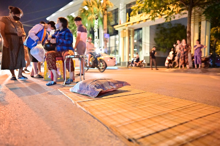 Eating and drinking, playing chess through the night waiting to receive tickets for the women's football final - 7