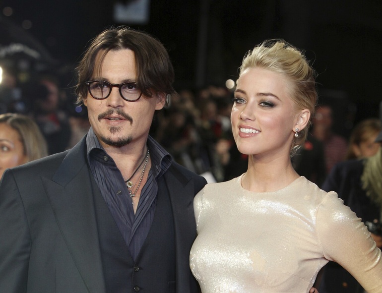 Cái khó của Amber Heard khi thua kiện