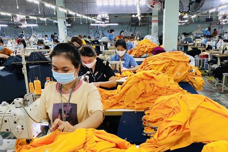 Quy định lương tối thiểu giờ góp phần hoàn thiện chính sách tiền lương - 1