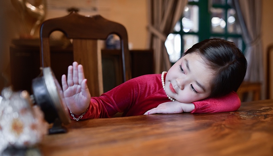 Bé Nguyễn Hồng Ngọc (5 tuổi), tên thường gọi là Bẹt. Bé lớn lên tại Sài Gòn.