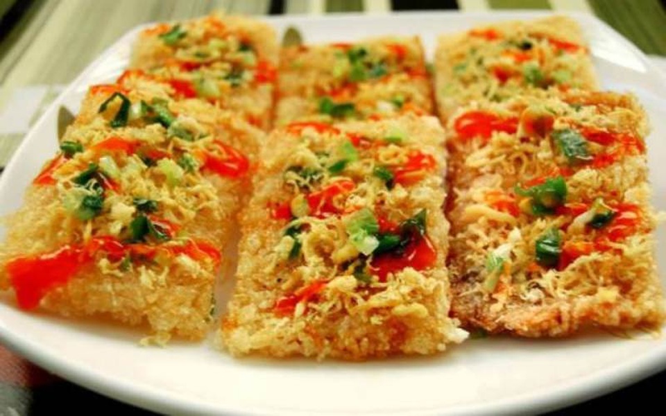 8 món cơm nức tiếng của người Việt - 4 Thịt dê - cơm cháy, cặp đôi đặc sản nức tiếng gần xa của Ninh Bình.