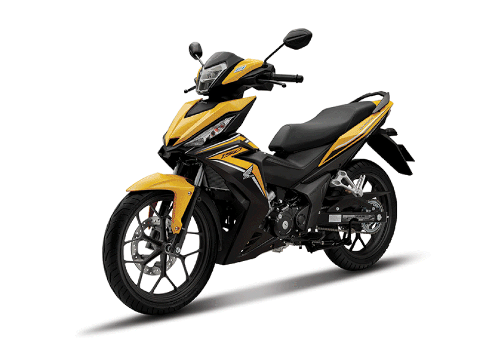 Honda nâng cấp Winner, giá không đổi, tặng thêm đồng hồ G-Shock - 2
Honda Winner ra mắt năm 2016 tại Triển lãm Môtô - Xe máy Việt Nam, chiếc xe này sử dụng động cơ phun xăng điện tử PGM-FI, 150cc, DOHC hộp số 6 cấp, 4 kì, xi lanh đơn, làm mát bằng dung dịch cùng hai bánh xe đường kính lớn giúp xe tạo được sự khác biệt so với các mẫu xe côn tay khác cùng phân khúc.