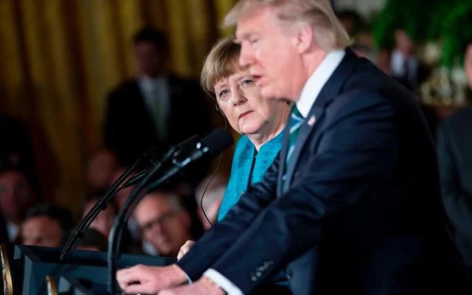Ông Trump từ chối bắt tay Thủ tướng Đức trong cuộc gặp đầu tiên - 2
Hai nhà lãnh đạo họp báo chung sau hội đàm. (Ảnh: AFP)