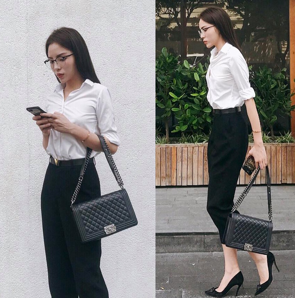 Hoa hậu Kỳ Duyên – từ giản dị đến lộng lẫy trên sàn catwalk - 1 Cô chọn sơ mi trắng và quần âu đen đơn giản, thanh lịch.