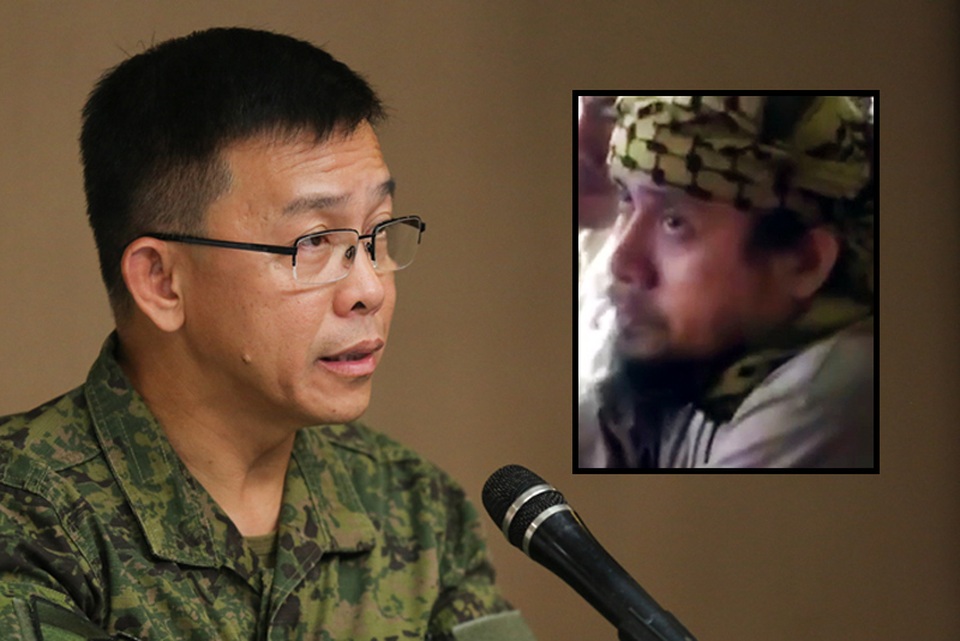 Philippines tìm ra nơi ẩn náu trùm khủng bố khét tiếng nhất châu Á - 1
Phát ngôn viên Lực lượng vũ trang Philipines Restituto Padilla Jr (trái) cho biết, quân đội Philippines tin Isnilon Hapilon (phải) đang ẩn náu ở Marawi. (Ảnh:Phil Star)