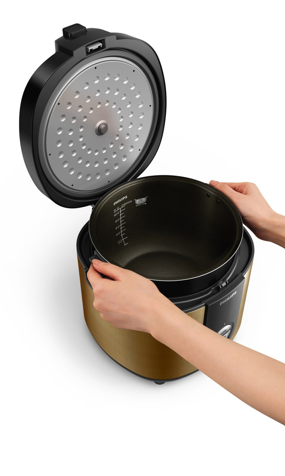 Giữa nhiều lựa chọn, đâu là nồi cơm điện chuẩn mực mới? - 2 Ngoài ra, nồi cơm Philips còn có tay cầm chống nóng, giúp thao tác tiện lợi không cần dùng đến găng tay.