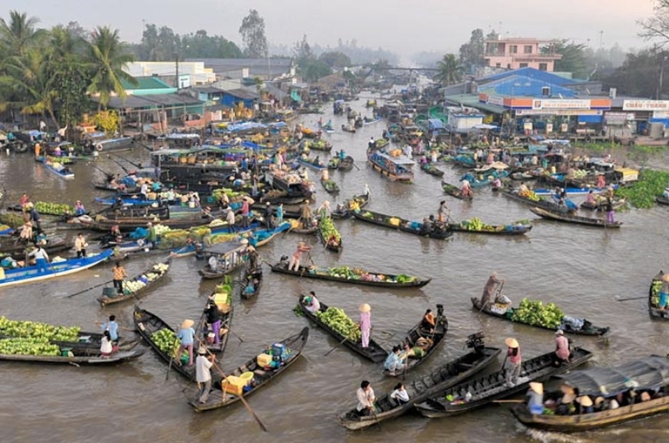 Những điểm đến lý tưởng trong dịp Tết Nguyên đán ở miền Trung và miền Nam - 8 Khung cảnh chợ nổi quen thuộc ở Đồng bằng sông Cửu Long.