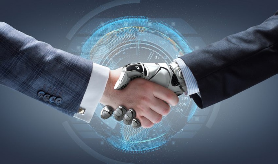 Trí tuệ nhân tạo có thể viết ra ngôn ngữ, đe doạ thay thế ngôn ngữ loài người - 2 Robot hiện đang bắt tay và phục vụ cho con người. Nhưng liệu có hay chăng một tương lai chúng vượt khỏi tầm kiểm soát, và lật đổ chúng ta?
