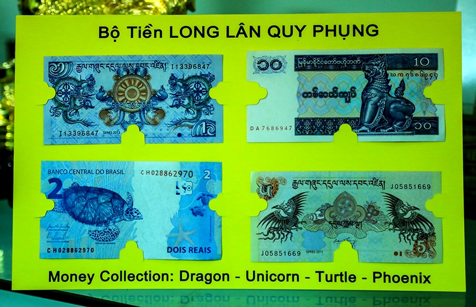 "Săn" tiền in hình con gà, số seri đẹp dịp Tết Đinh Dậu - 10
Bộ tiền với ý nghĩa tứ linh long - lân - quy - phụng sum vầy của các quốc gia cũng được nhiều người tìm mua và được bán với giá 150.000 một bộ.