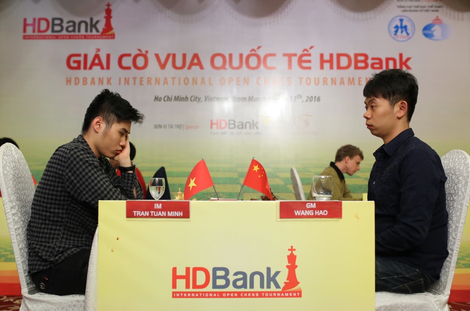 Kỳ thủ Việt Nam vô địch cờ nhanh lứa tuổi U20 châu Á - 1 Trần Tuấn Minh (trái) vô địch cờ nhanh U20 châu Á