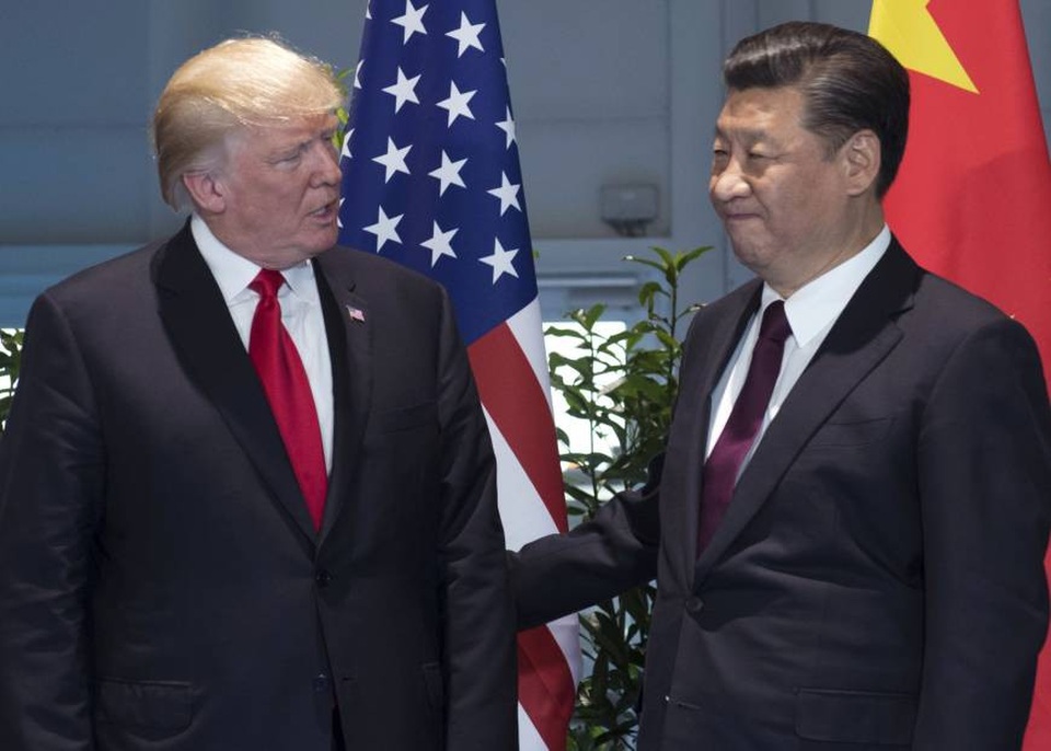 Ông Trump cảnh báo Trung Quốc về Triều Tiên trước chuyến thăm châu Á - 1 Tổng thống Donald Trump gặp Chủ tịch Tập Cận Bình bên lề hội nghị G20 tại Đức hồi tháng 7 (Ảnh: AP)